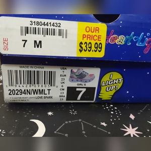 Girls Skechers white with heart light ups size 7